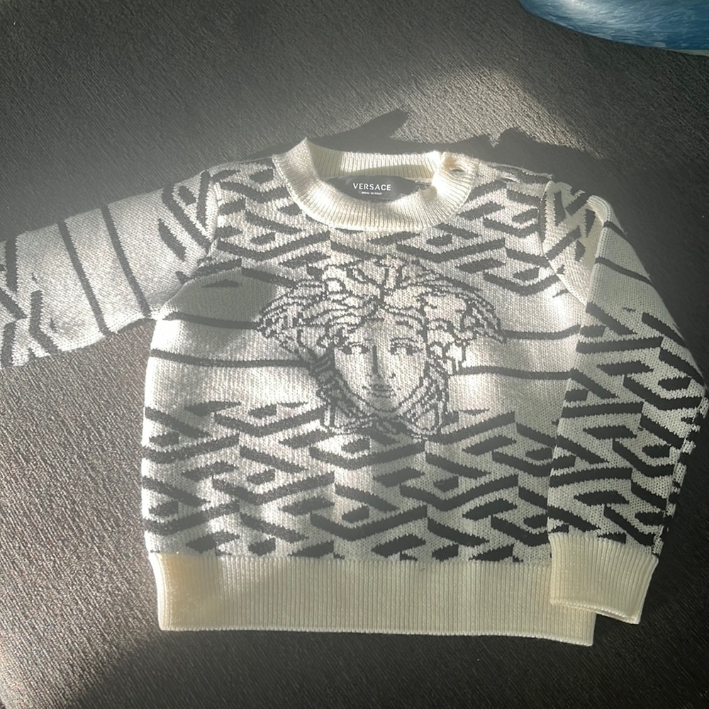 6-9 month adorable cream Versace knit sweater!! Worn once for baby photo shoot!